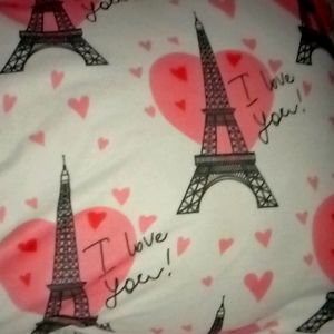 A pink black white Paris theme pillow